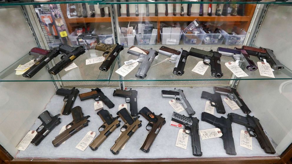PHOTO: Semi-automatic handguns are displayed at shop in New Castle, Pa., March 25, 2020.