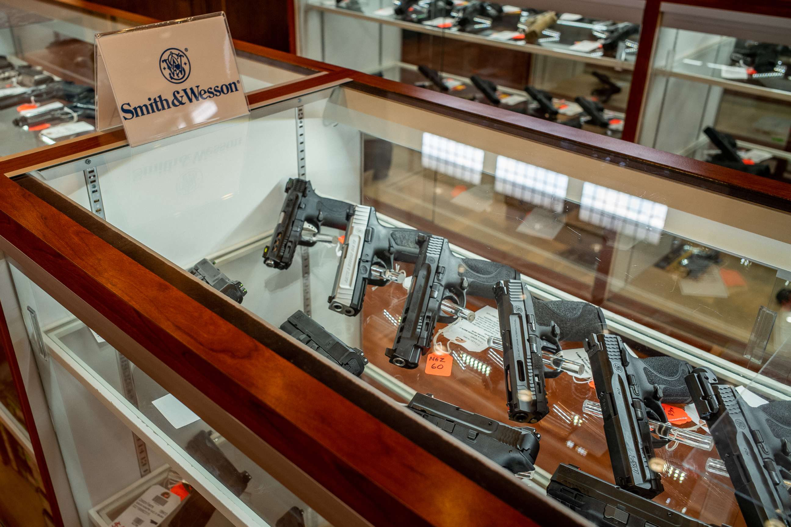 PHOTO: In this Sept. 9, 2022, file photo, Smith & Wesson handguns are seen for sale in a gun store in Houston, Texas.