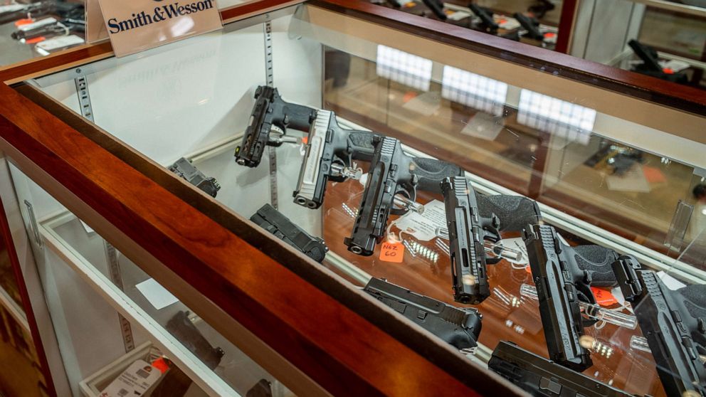 PHOTO: In this Sept. 9, 2022, file photo, Smith & Wesson handguns are seen for sale in a gun store in Houston, Texas.