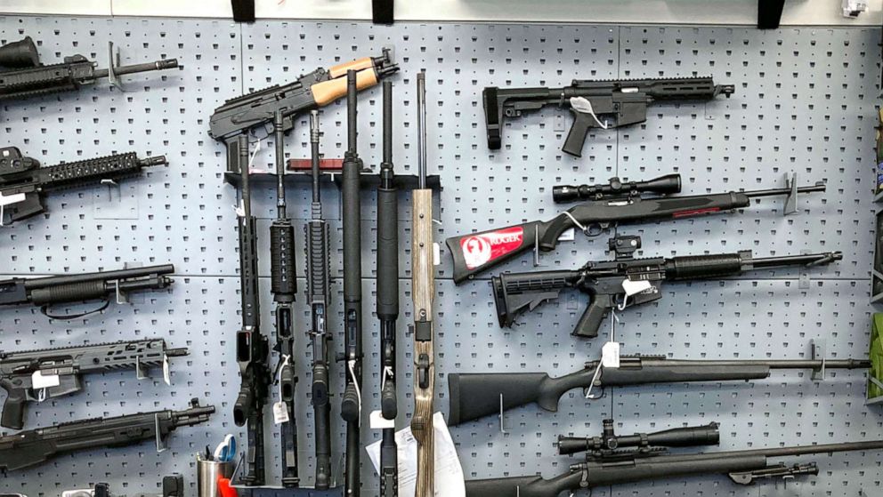 PHOTO: In this Feb. 19, 2021, file photo, firearms are displayed at a gun shop in Salem, Ore.