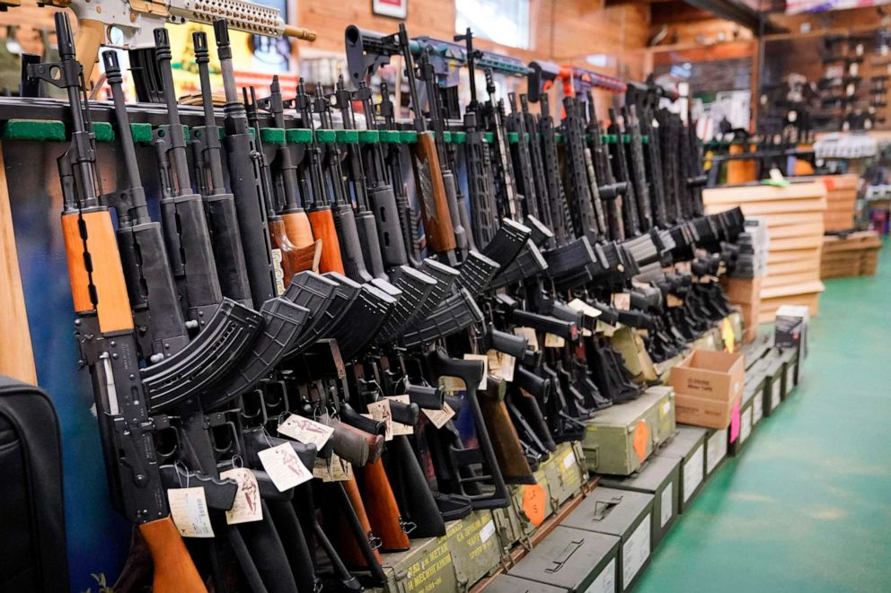 PHOTO: FILE - Semi-automatic rifles are displayed at Coastal Trading and Pawn, July 18, 2022, in Auburn, Maine.