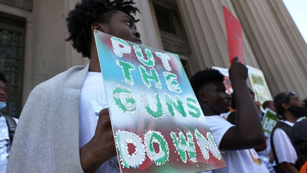 PHOTO: NEW YORK, NEW YORK - JULY 19: People gather at the "Stand Up Against Gun Violence" rally at Bronx Borough Hall on July 19, 2021 in South Bronx in New York City. 