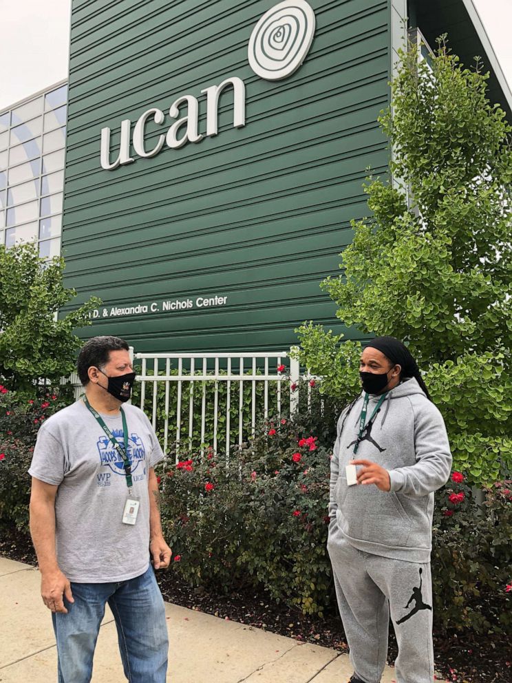 PHOTO: Reggie Woods, right, and Frank Perez are pictured outside the UCAN Chicago offices in Chicago.