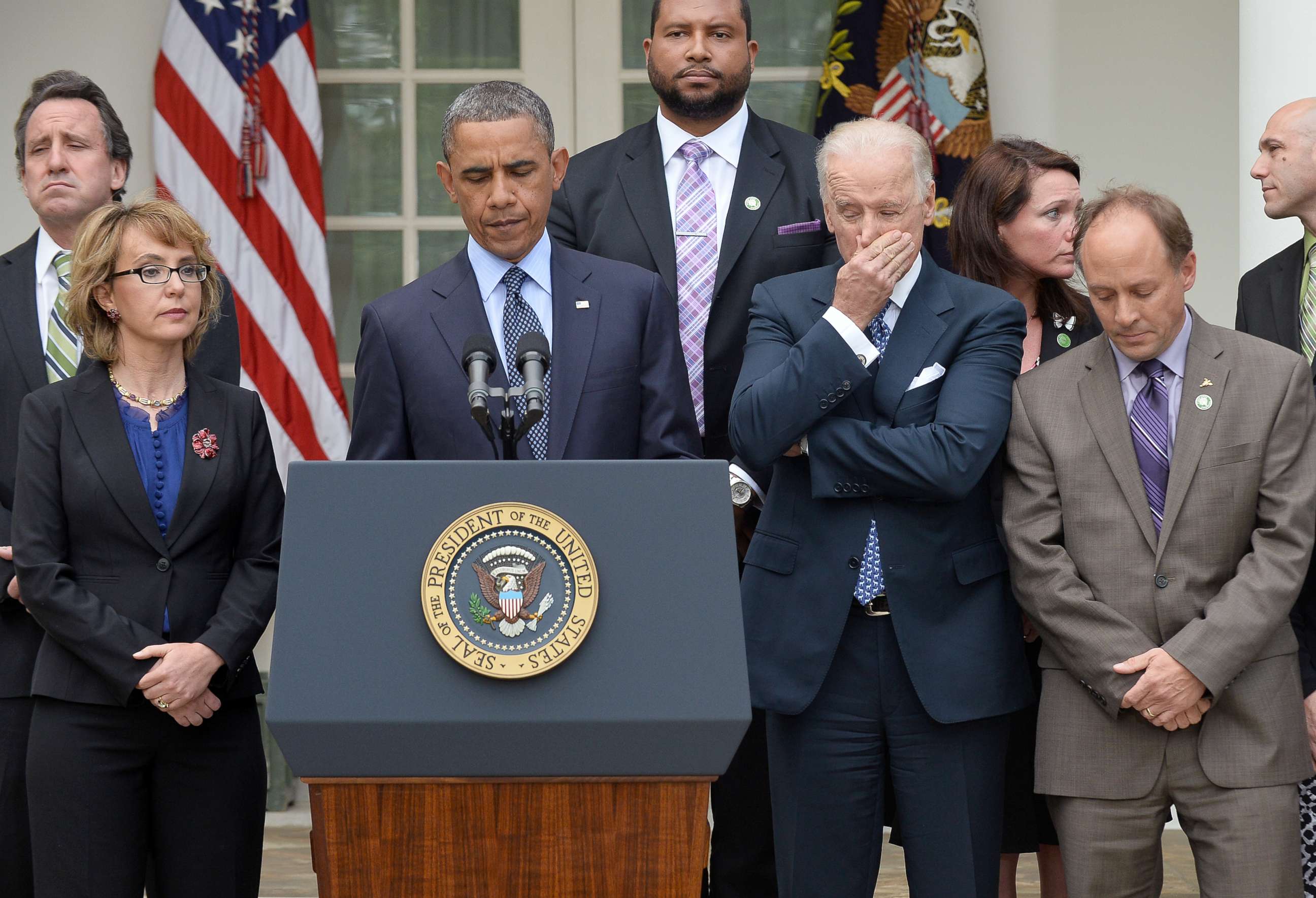 PHOTO: President Barack Obama is accompanied by former lawmaker Gabrielle Giffords, vice president Joe Biden and family members of Newtown school shooting victims as he speaks on gun control at the Rose Garden of the White House in Washington.