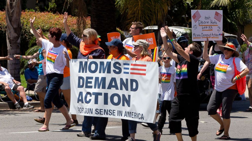 PHOTO: Moms demand action for gun sense in America, carry a banner at the San Diego Pride Parade. 