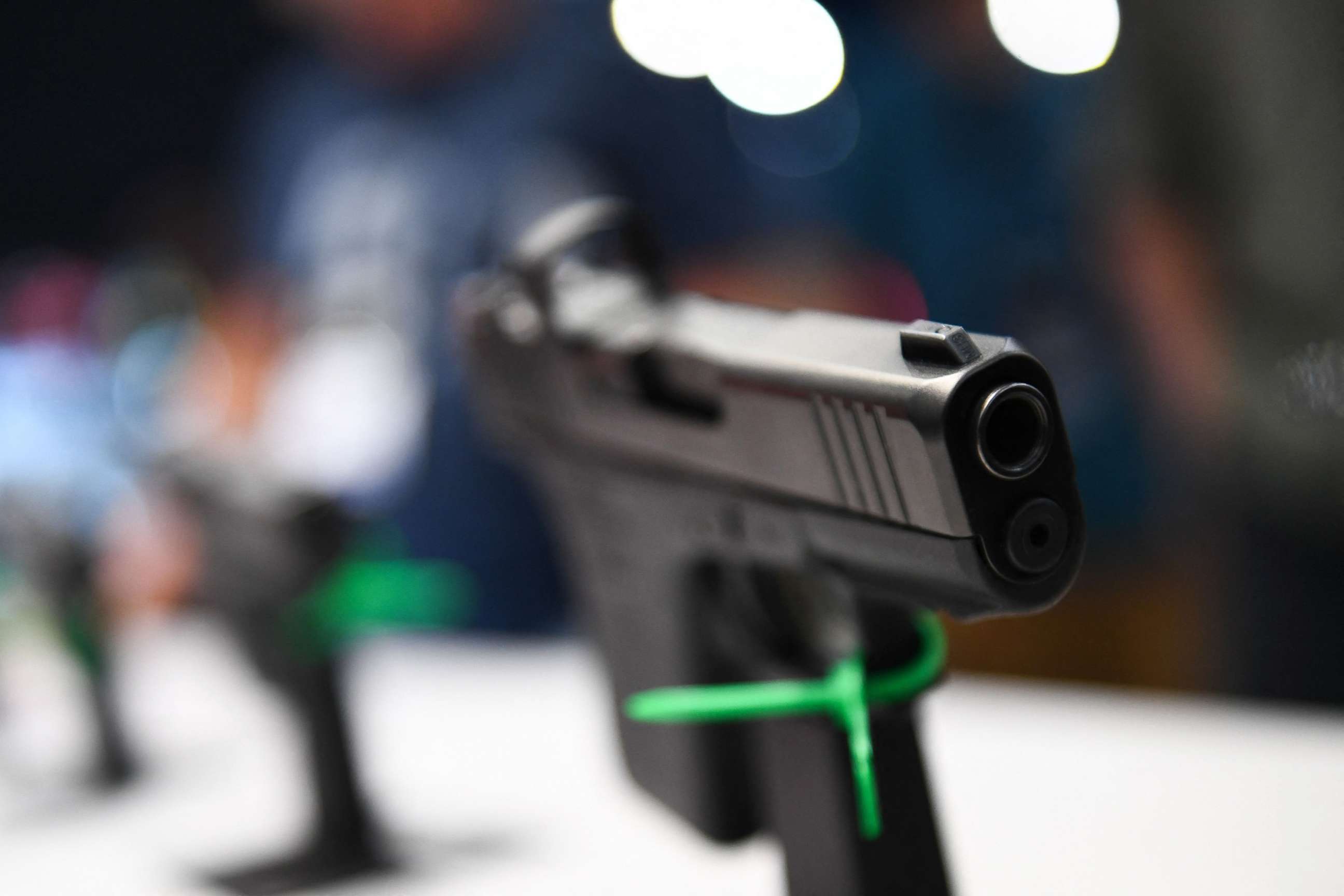 PHOTO: Pistols are displayed during the National Rifle Association (NRA) Annual Meeting at the George R. Brown Convention Center, in Houston, May 28, 2022.