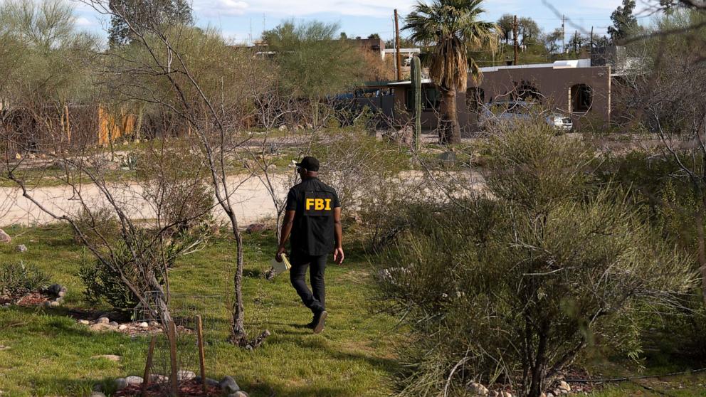 PHOTO: An investigator canvasses Annie Guthrie's neighborhood after the disappearance of Nancy Guthrie, the 84-year-old mother of U.S. journalist and television host Savannah Guthrie, who went missing from her home in Tucson, Feb. 10, 2026.