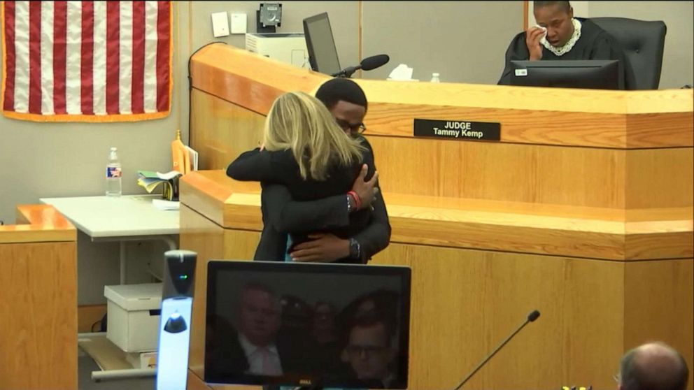 PHOTO: Botham Jean's brother Brandt hugs Amber Guyger after her sentencing, Oct 2, 2019.