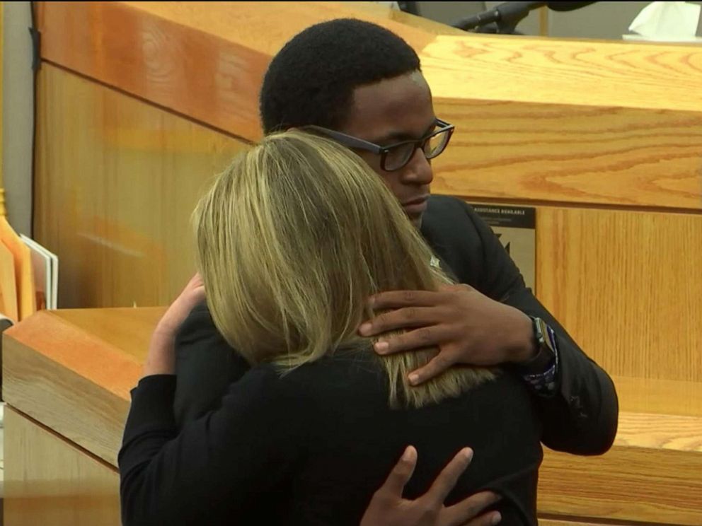 PHOTO: Botham Jeans brother Brandt hugs Amber Guyger after her sentencing, Oct 2, 2019.