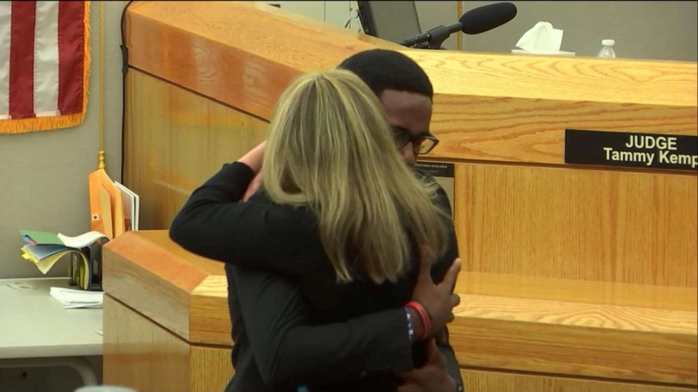 PHOTO: Botham Jean's brother Brandt hugs Amber Guyger after her sentencing, Oct 2, 2019.