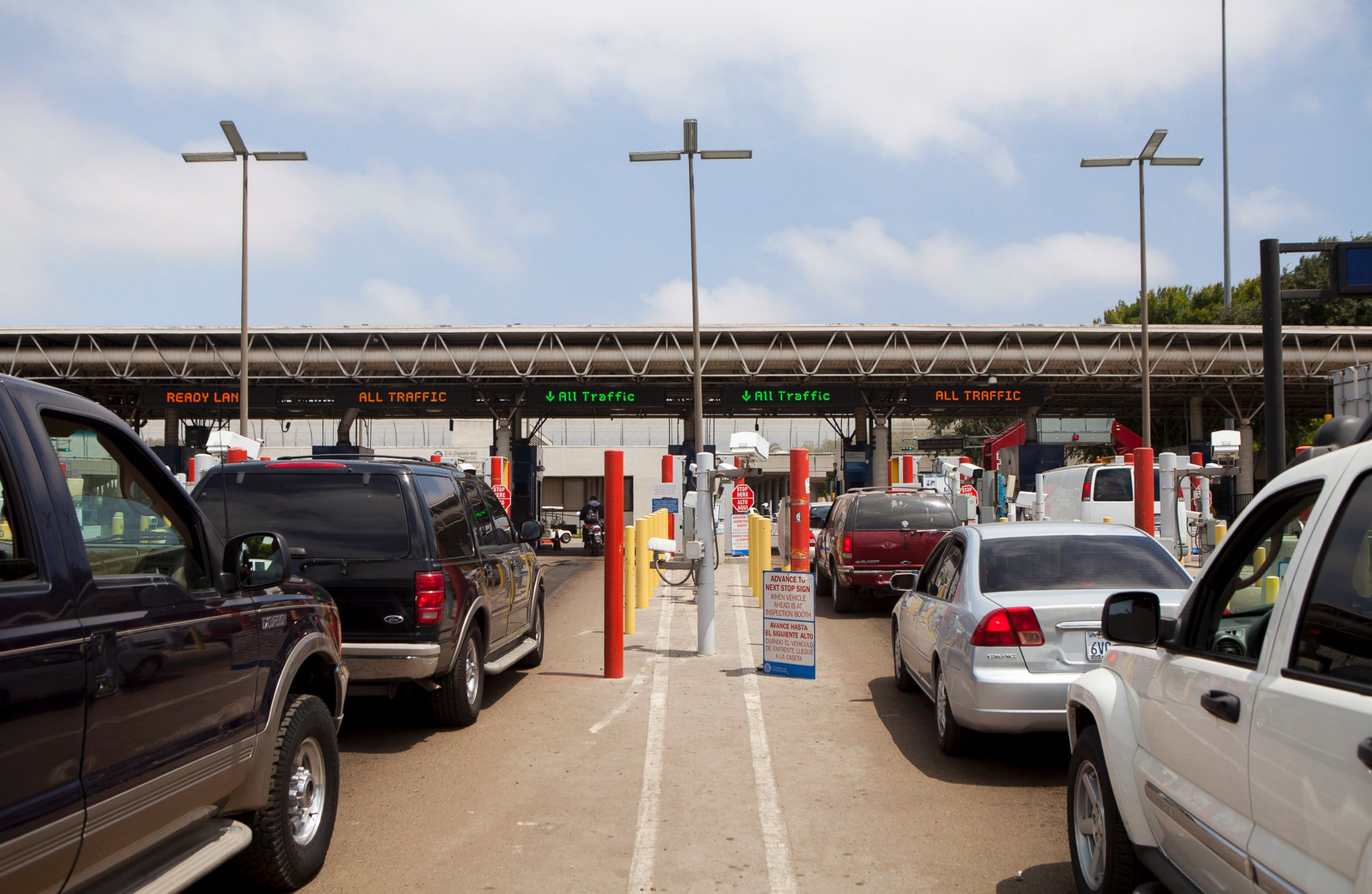 PHOTO: Cars that have just crossed into the U.S. from Mexico wait to speak to a U.S. Customs and Border Protection (CBP) officer at the Otay Mesa Port of Entry in San Diego, California, U.S., on Friday, June 7, 2013.