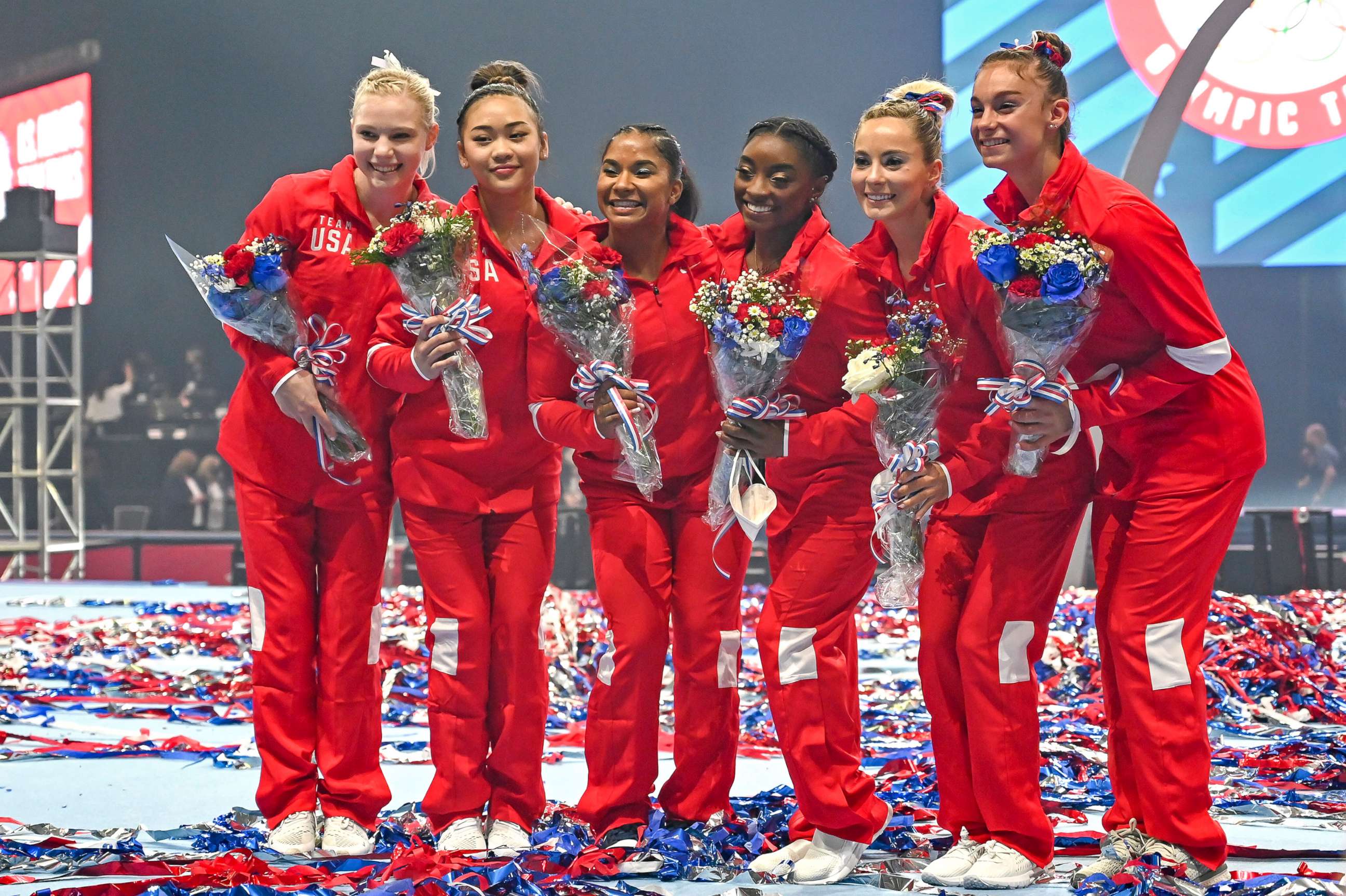 PHOTO: U.S. gymnastics Olympic team members Jade Carey, Sunisa Lee, Jordan Chiles, Simone Biles, Mikayla Skinner and Grace McCallum pose for a photo at the America's Center in St. Louis.