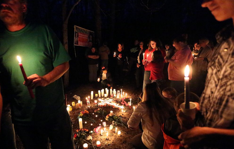 PHOTO: People gather for a vigil for Heather Elvis at Peachtree Landing in Myrtle Beach, S.C., Feb. 24, 2014.