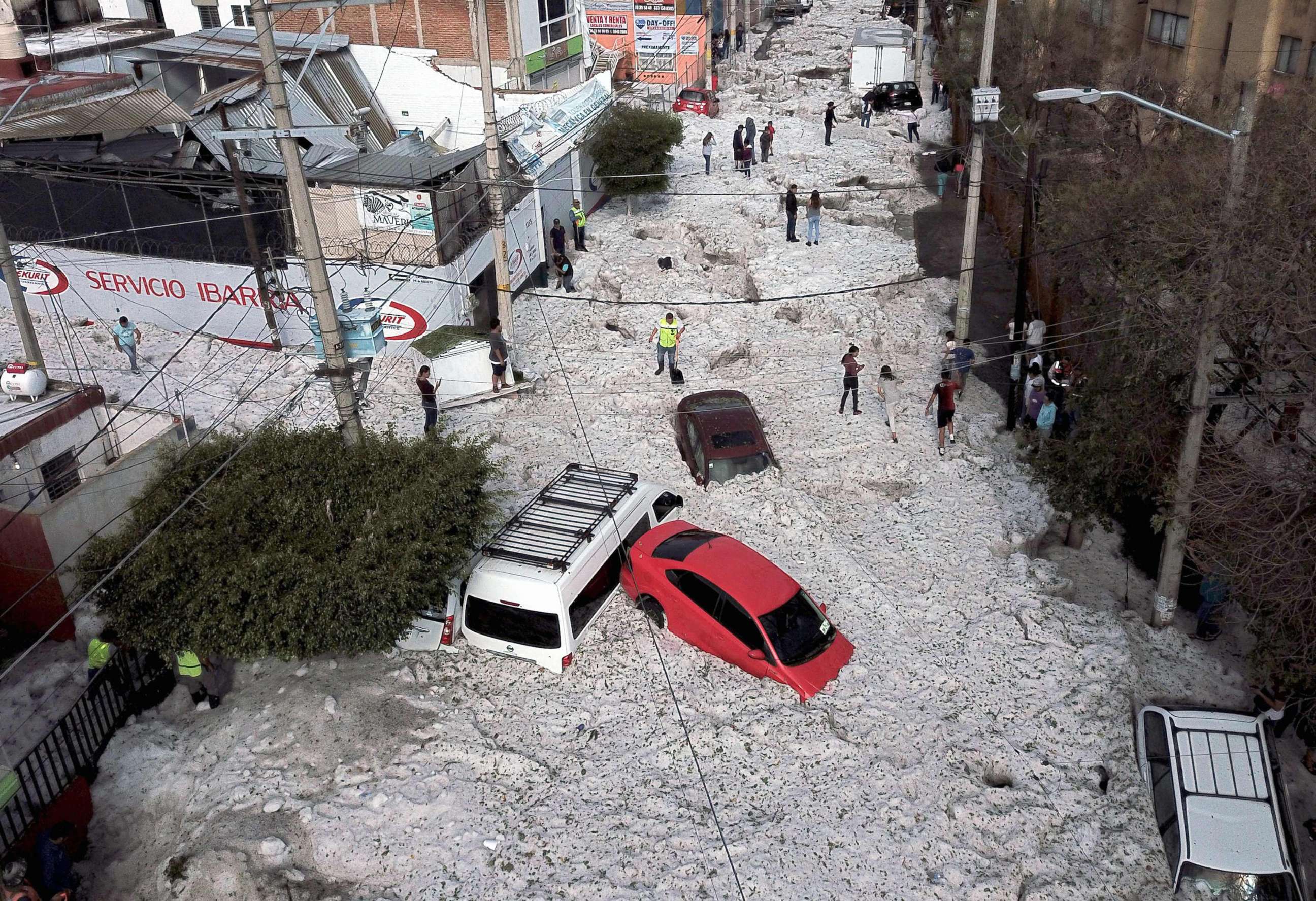 PHOTO: Vehicles are buried in hail in the streets in the eastern area of Guadalajara, Jalisco state, Mexico, June 30, 2019.