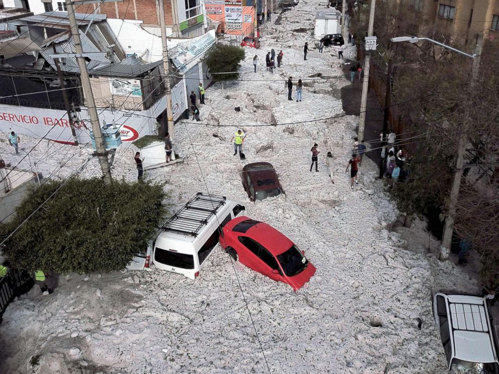 PHOTO: Vehicles are buried in hail in the streets in the eastern area of Guadalajara, Jalisco state, Mexico, June 30, 2019.