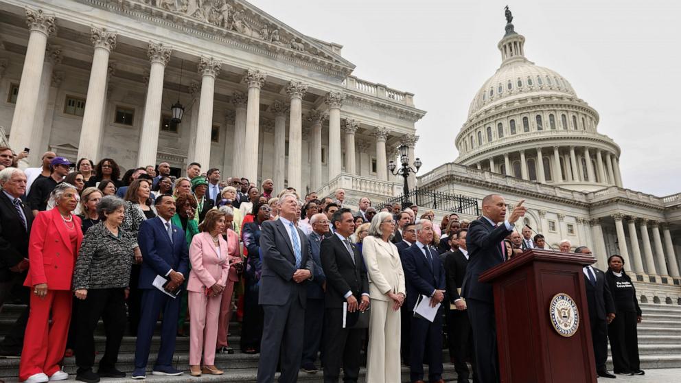 PHOTO: Backed by fellow Democratic House members, House Minority Leader Hakeem Jeffries speaks on the steps of the U.S. Capitol in Washington, July 2, 2025.