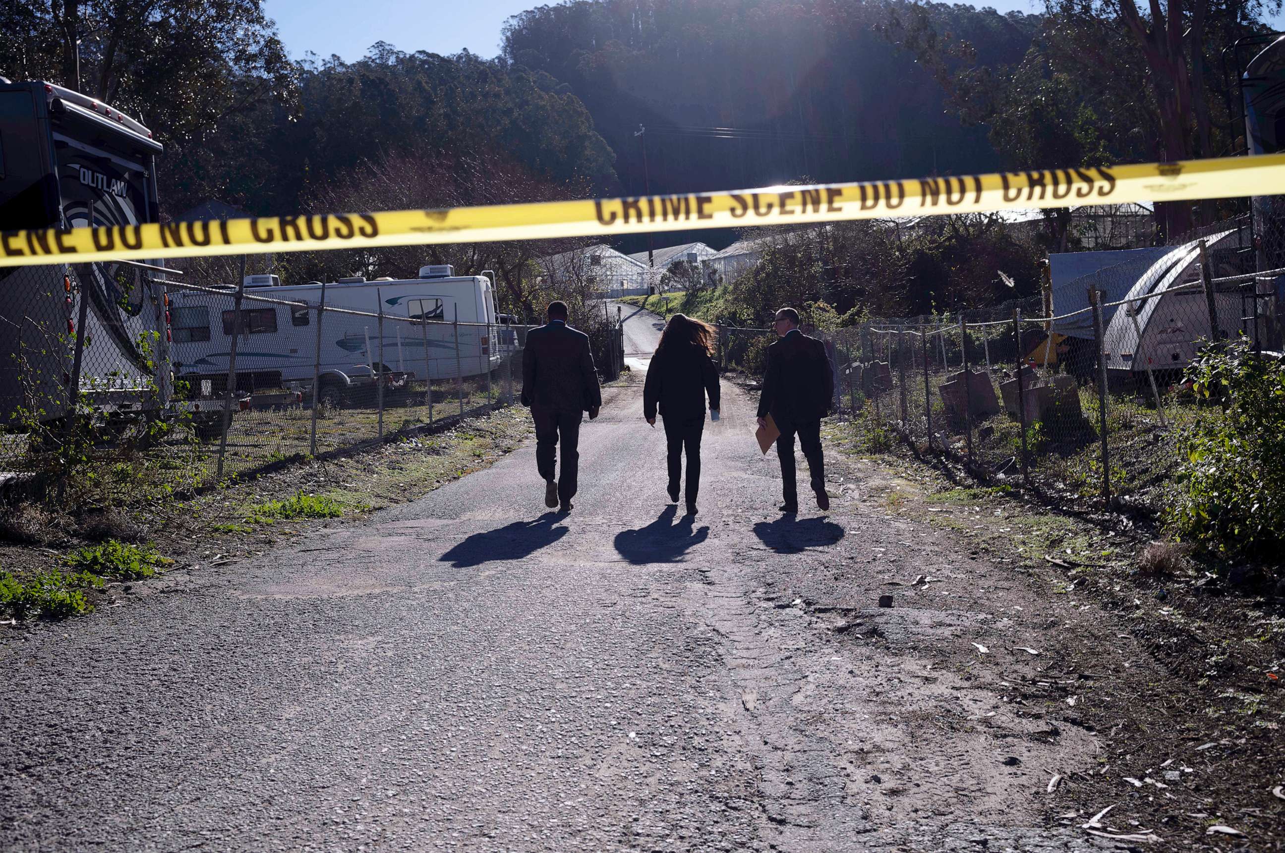 PHOTO: FBI officials walk towards from the crime scene at Mountain Mushroom Farm, Jan. 24, 2023, after a gunman killed several people at two agricultural businesses in Half Moon Bay, Calif.
