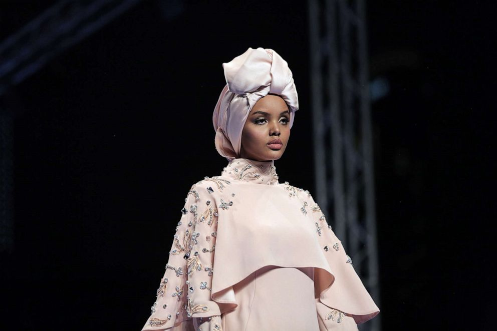 PHOTO: In this Dec. 8, 2017, file photo, Halime Aden models the first modest creation of designer Rasit Bagzibagli during the Dubai Modest Fashion Week at Dubai Burj Park in Dubai, U.A.E.