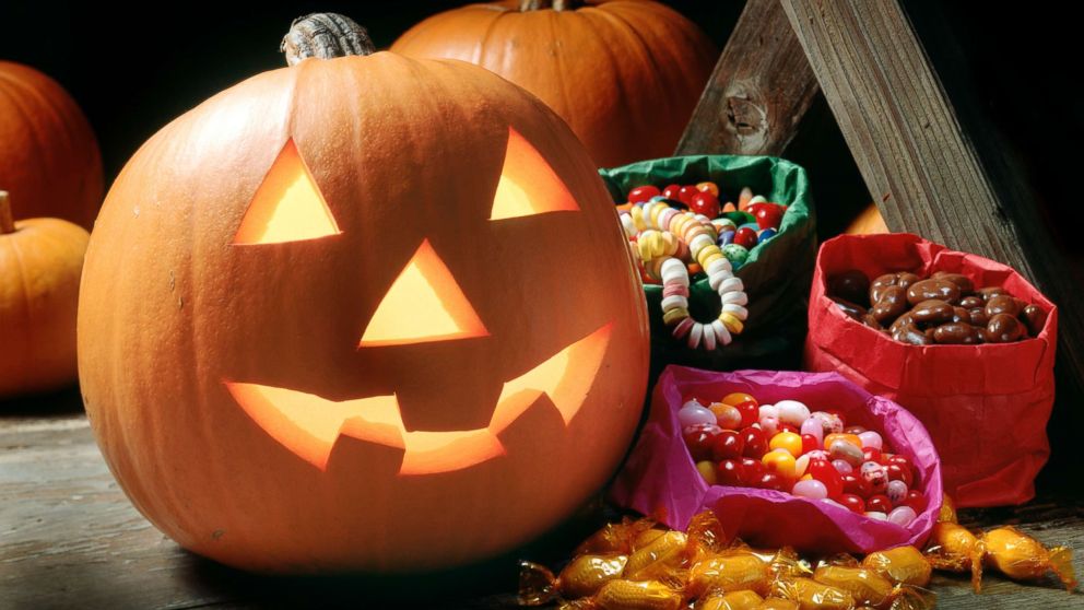 PHOTO: Halloween pumpkin with candy.