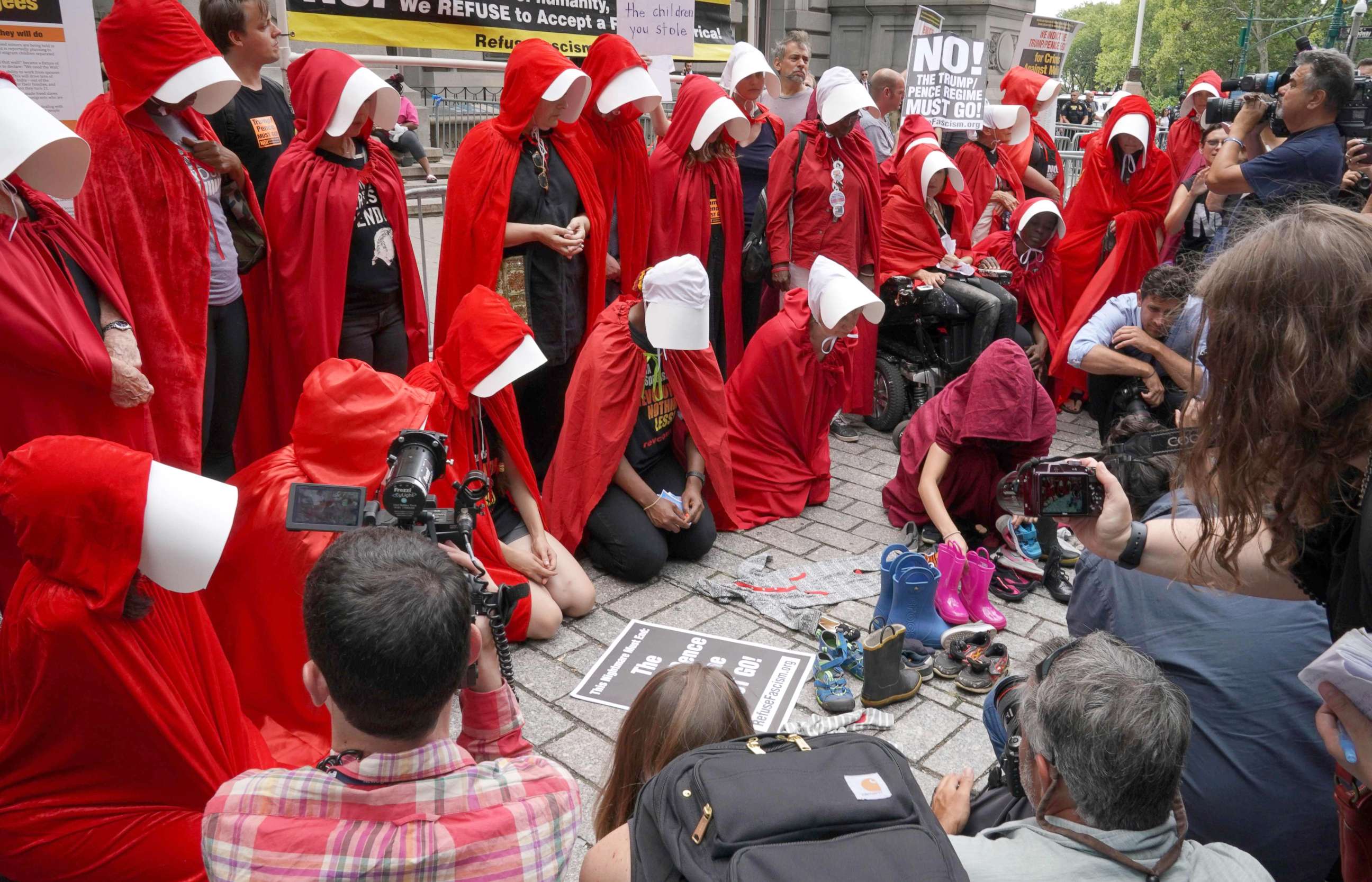 PHOTO: Women dressed dressed as characters from the novel-turned-TV series "The Handmaid's Tale" protest in front of the Alexander Hamilton Customs House, July 31, 2018, in New York City.