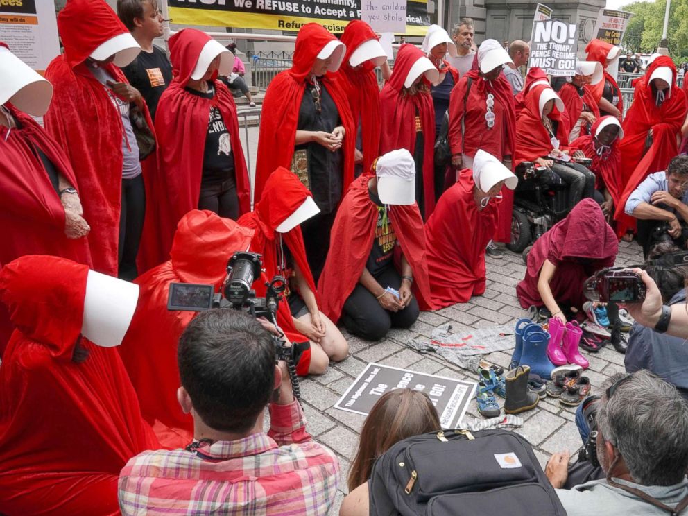 PHOTO: Women dressed dressed as characters from the novel-turned-TV series The Handmaids Tale protest in front of the Alexander Hamilton Customs House, July 31, 2018, in New York City.