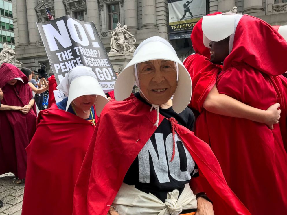 PHOTO: Women dressed in the robes of "The Handmaid's Tale" express their support for abortion rights and demand that migrant children separated from their parents be reunited during a protest in Manhattan July 31, 2018.