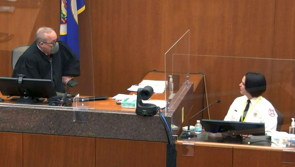 PHOTO: Hennepin County District Judge Peter Cahill speaks to witness Genevieve Hansen, a fire department emergency medical technician (EMT) during the trial of former Minneapolis police officer Derek Chauvin, in Minneapolis, March 30, 2021.