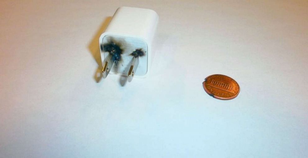 PHOTO: A phone charger and penny that were found after several outlets were damaged at Whitman-Hanson Regional High School last week.