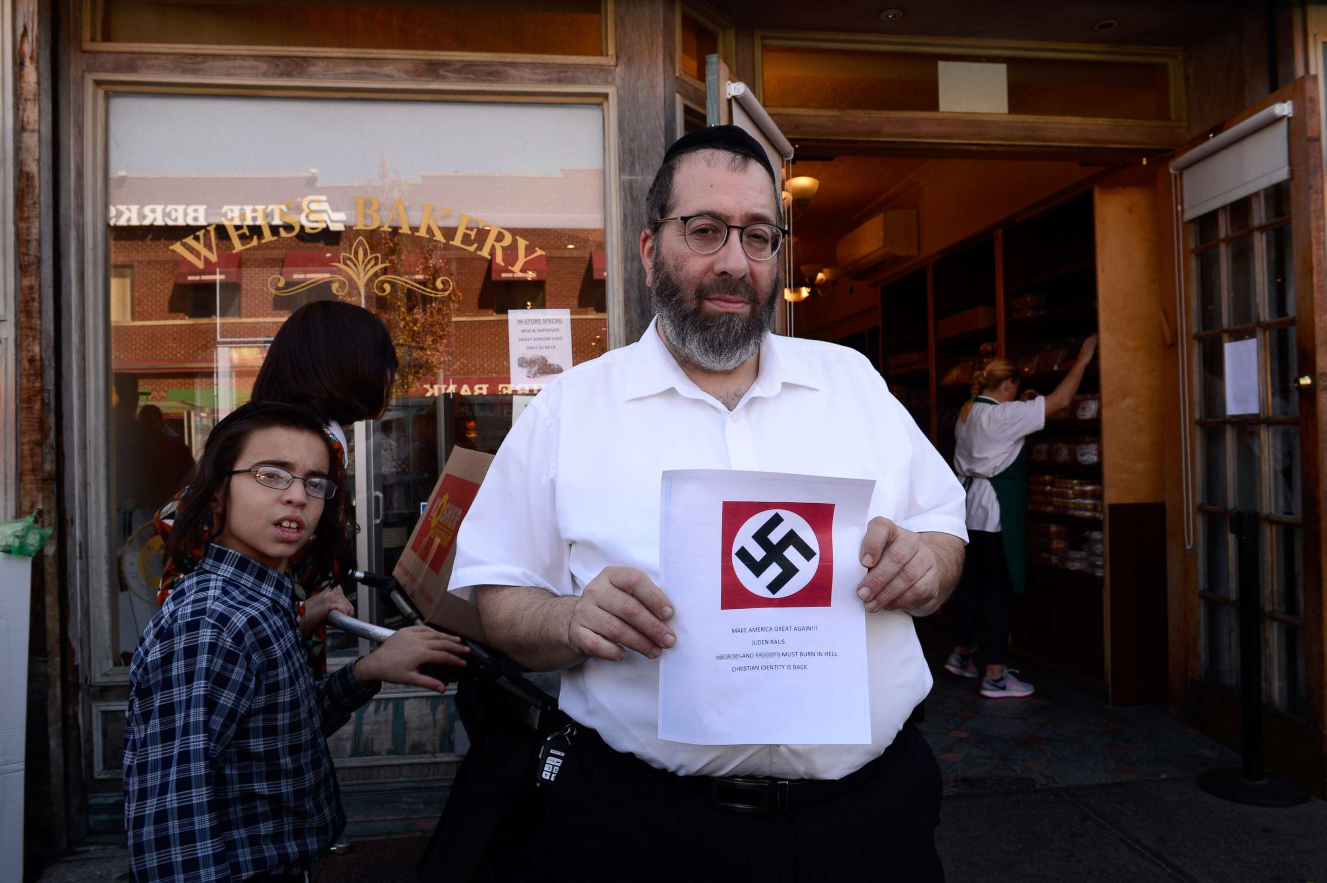 PHOTO: Abraham Weiss, owner of a kosher bakery in Brooklyn, holds a letter with a swastika and hate speech that his bakery and several other businesses in New York reportedly received, Oct. 4, 2017.