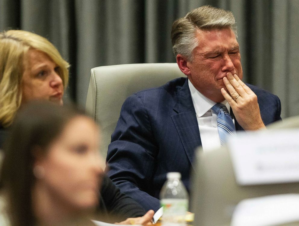 PHOTO: Mark Harris, Republican candidate in North Carolina's 9th Congressional race, fights back tears at the conclusion of his son John Harris's testimony, Feb. 20, 2019, at the North Carolina State Bar in Raleigh, N.C.