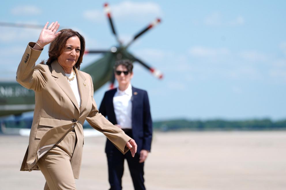 PHOTO: Vice President Kamala Harris, left, waves as she arrives to board Air Force Two at Andrews Air Force Base in Md., Saturday, July 27, 2024.