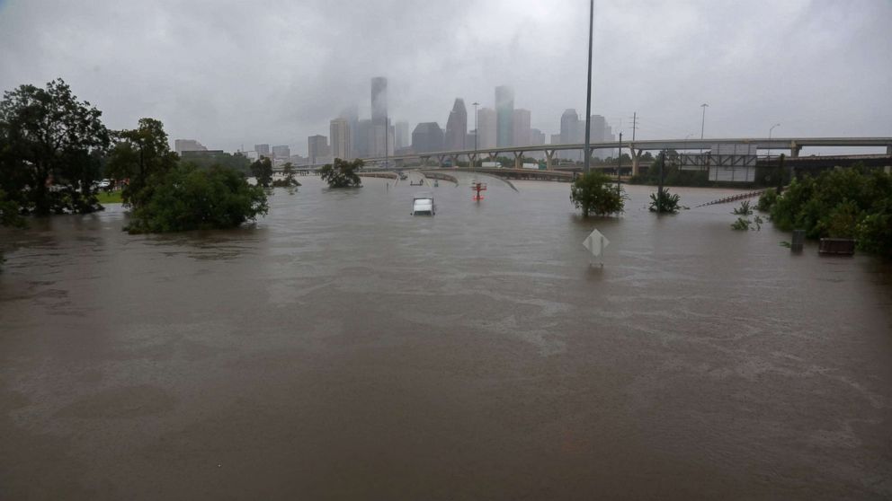 VIDEO: Floodwaters spill over banks into city riddled with rivers and bayous