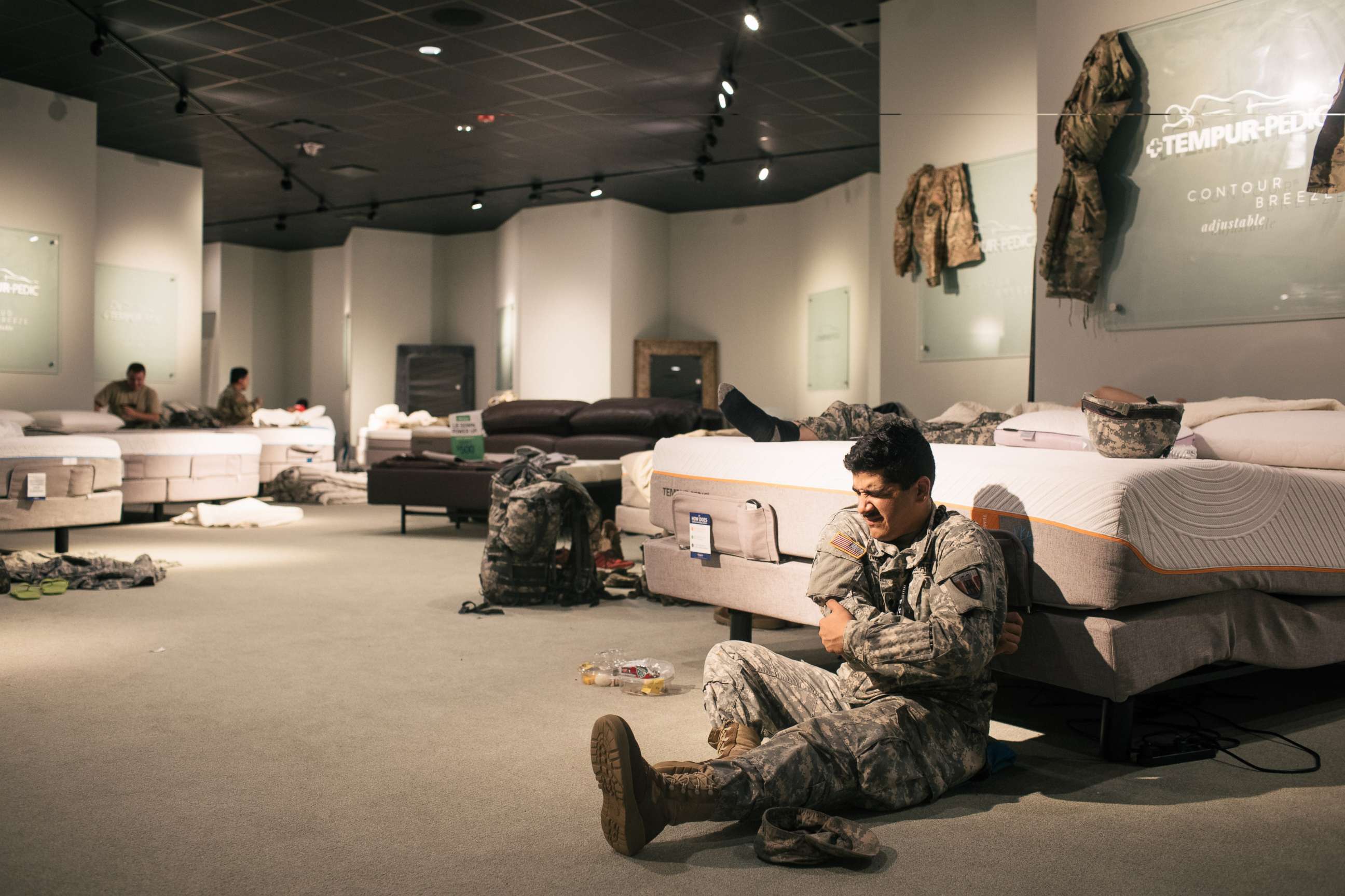 PHOTO: Members of the National Guard rest at a Gallery Furniture store in Richmond, Texas, Aug. 29, 2017. 