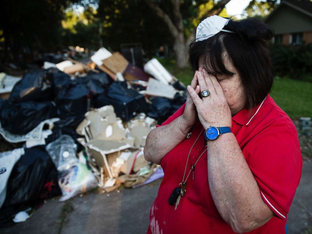 PHOTO: Peggy Lanigan pauses during the aftermath of Hurricane Harvey in Houston, Sept. 6, 2017.