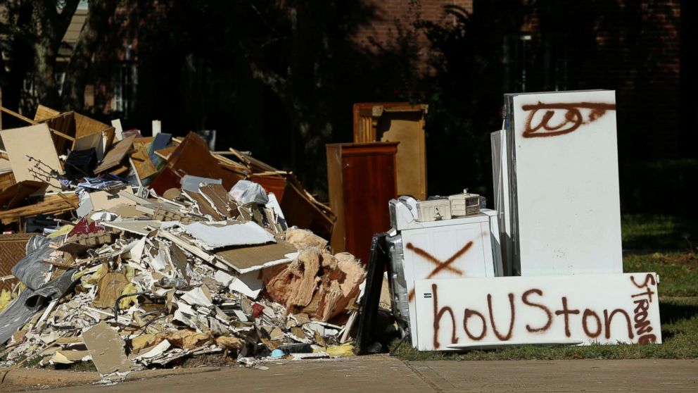 PHOTO: Flood-damaged contents from homes line the roads along residential streets in the aftermath of  Harvey on the west side of Houston, Sept. 7, 2017.