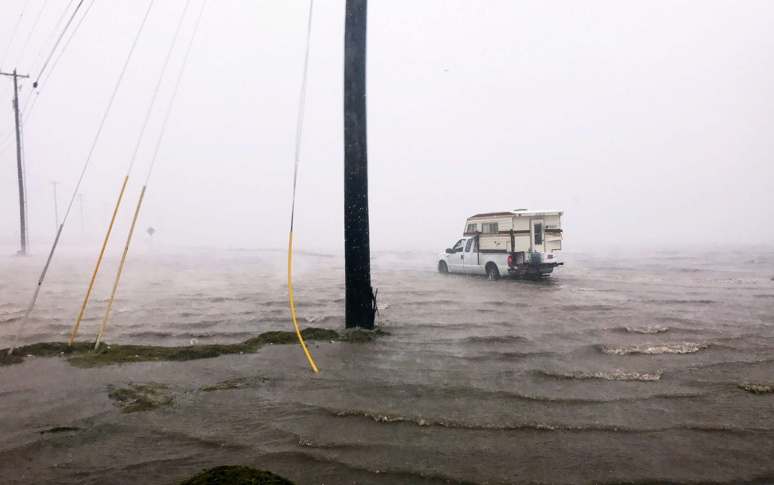 PHOTO: Craig "Cajun" Uggen, 57, nearly floods his truck as Hurricane Harvey comes ashore in Corpus Christi, Texas, Aug. 25, 2017. 
