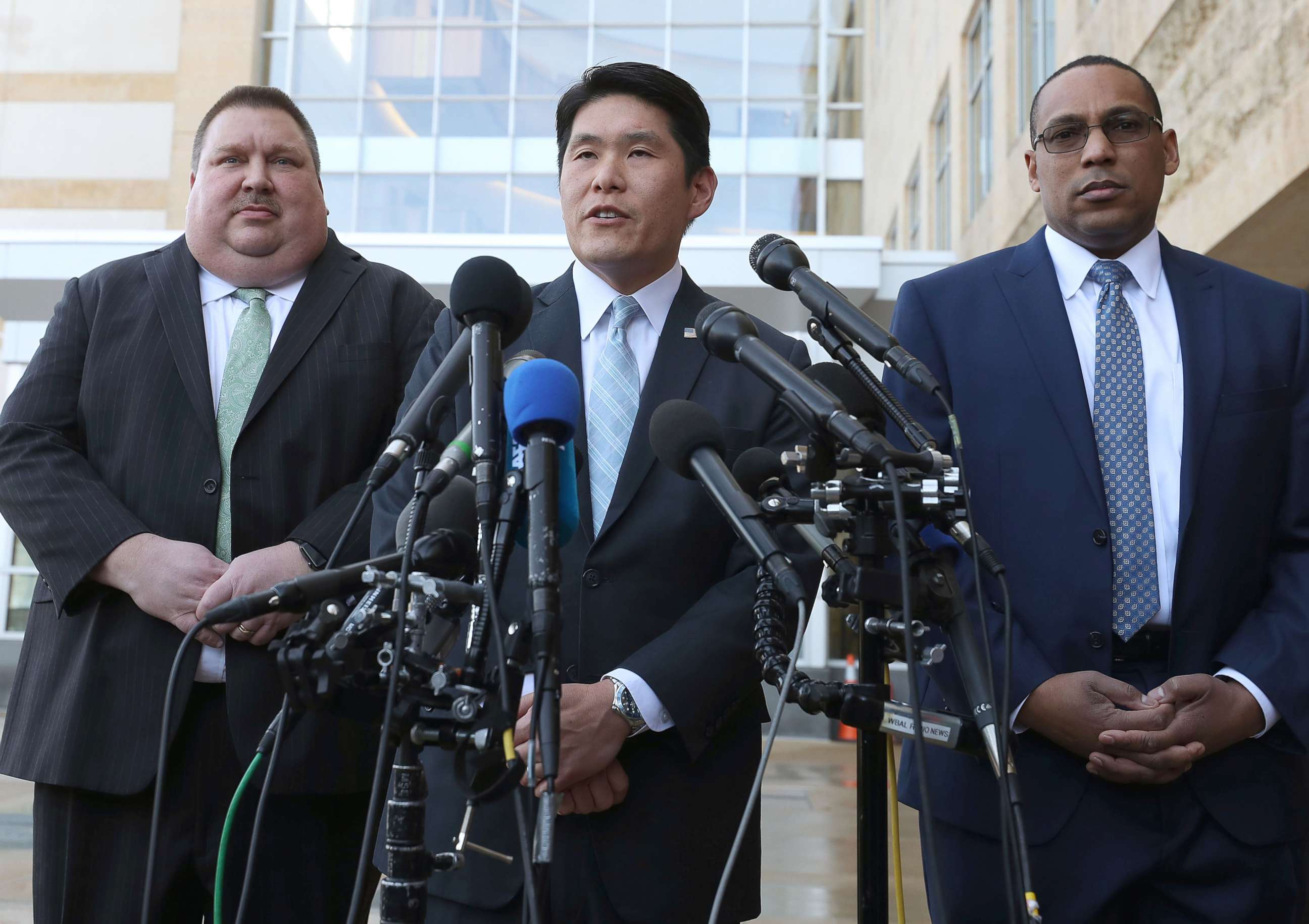 PHOTO: U.S. Attorney Robert Hur, center, speaks while flanked by FBI Special Agent Gordon Johnson and Art Walker, of the Coast Guard Investigative Service, after a hearing at the U.S. District Court Greenbelt Division, Feb. 21, 2019, in Greenbelt, Md.