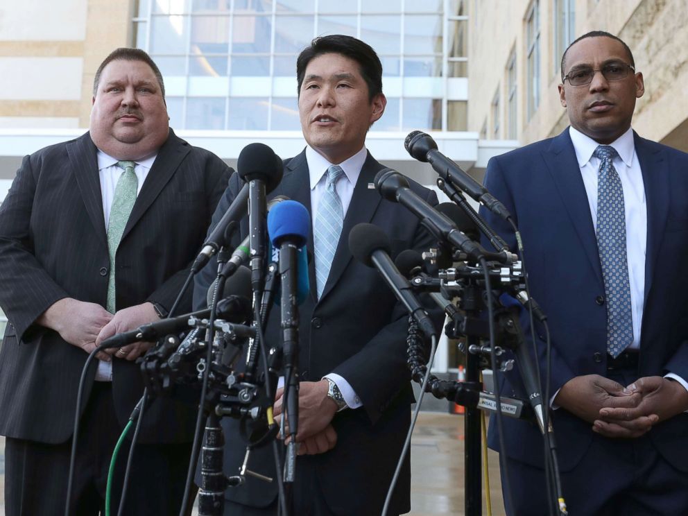 PHOTO: U.S. Attorney Robert Hur, center, speaks while flanked by FBI Special Agent Gordon Johnson and Art Walker, of the Coast Guard Investigative Service, after a hearing at the U.S. District Court Greenbelt Division, Feb. 21, 2019, in Greenbelt, Md.