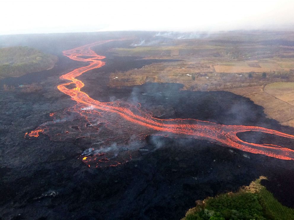 PHOTO: Lava from the Kilauea Volcano flows over Hawaii's Lower East Rift Zone, July 2018.