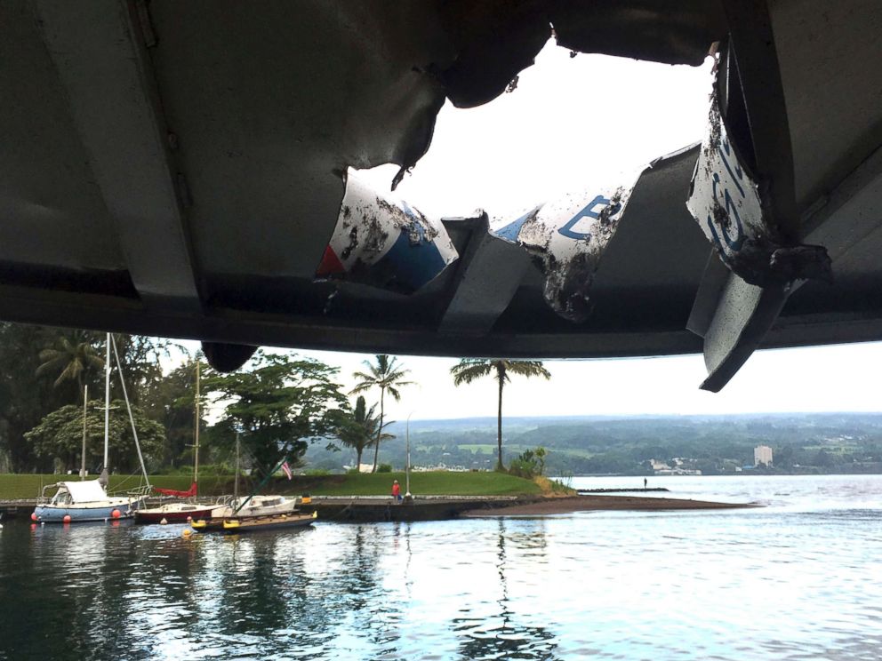 PHOTO: This photo provided by the Hawaii Department of Land and Natural Resources shows damage to the roof of a tour boat after an explosion sent lava flying through the roof off the Big Island of Hawaii on July 16, 2018, injuring at least 23 people.