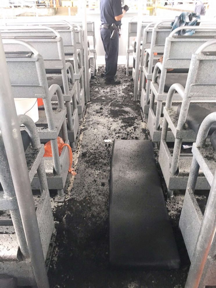 PHOTO: A handout photo made available by the Hawaii Department of Land and Natural Resources (DLNR) shows damage to a Lava Boat Tour vessel after it was hit by a 'lava bomb', July 16, 2018.