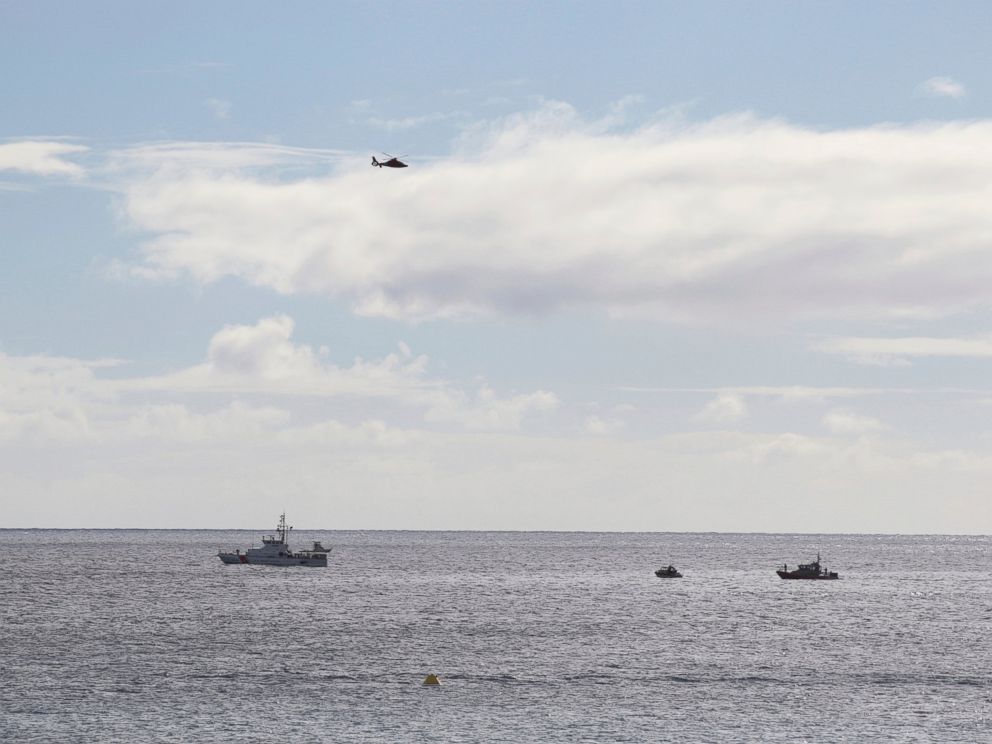 PHOTO: A U.S. Coast Guard vessel and other rescue boats respond to a plane crash off Honolulu, Wednesday, Dec. 12, 2018. Federal Aviation Administration spokesman Ian Gregor said a Hawker Hunter jet went down in the ocean around 2:25 p.m.