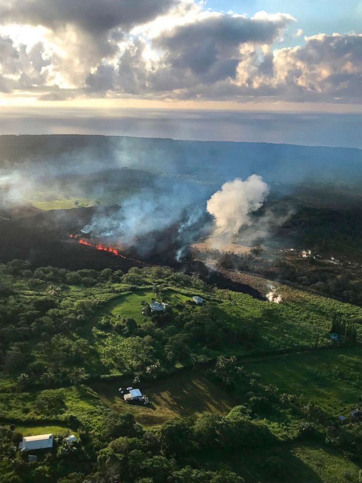 PHOTO: This image released by the US Geological Survey shows a fissure still erupting on May 14, 2018, and supplying lava to a flow that was still advancing at Hawaii's Big Island.