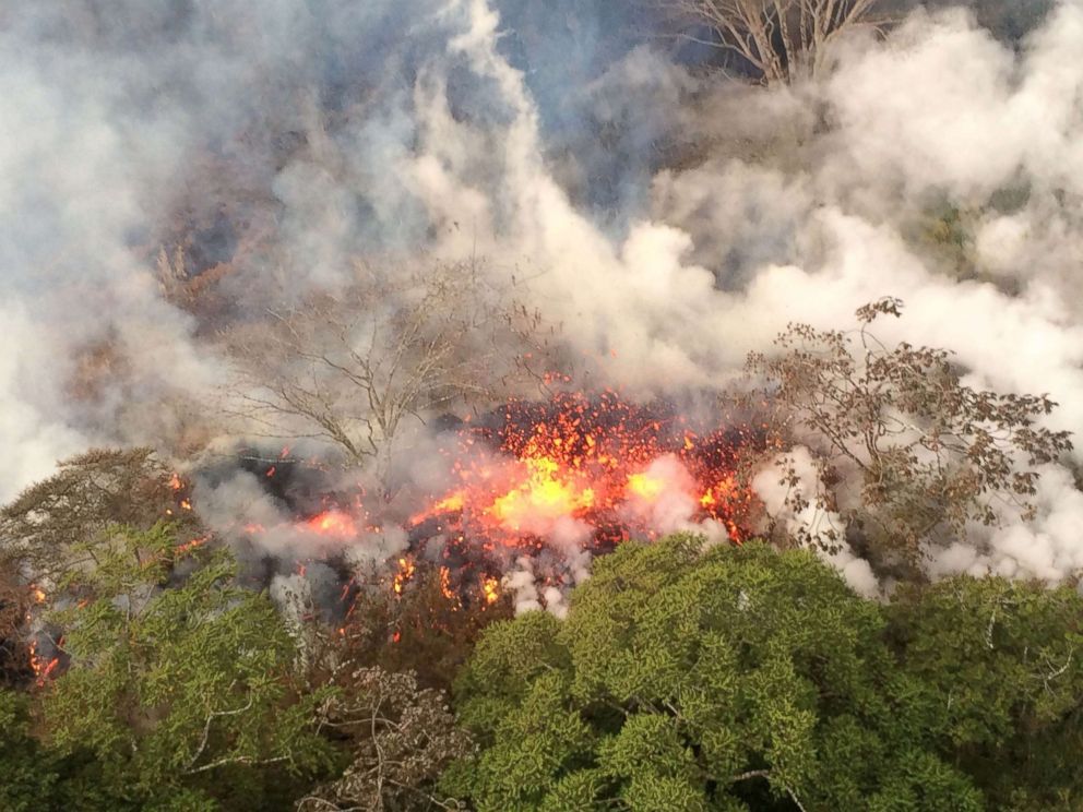 PHOTO: This image released by the U.S. Geological Survey on May 17, 2018 shows lava spattering  from an area between fissures 16 and 20 at 8:20 a.m. HST from the Kilauea Volcano, May 16, 2018.