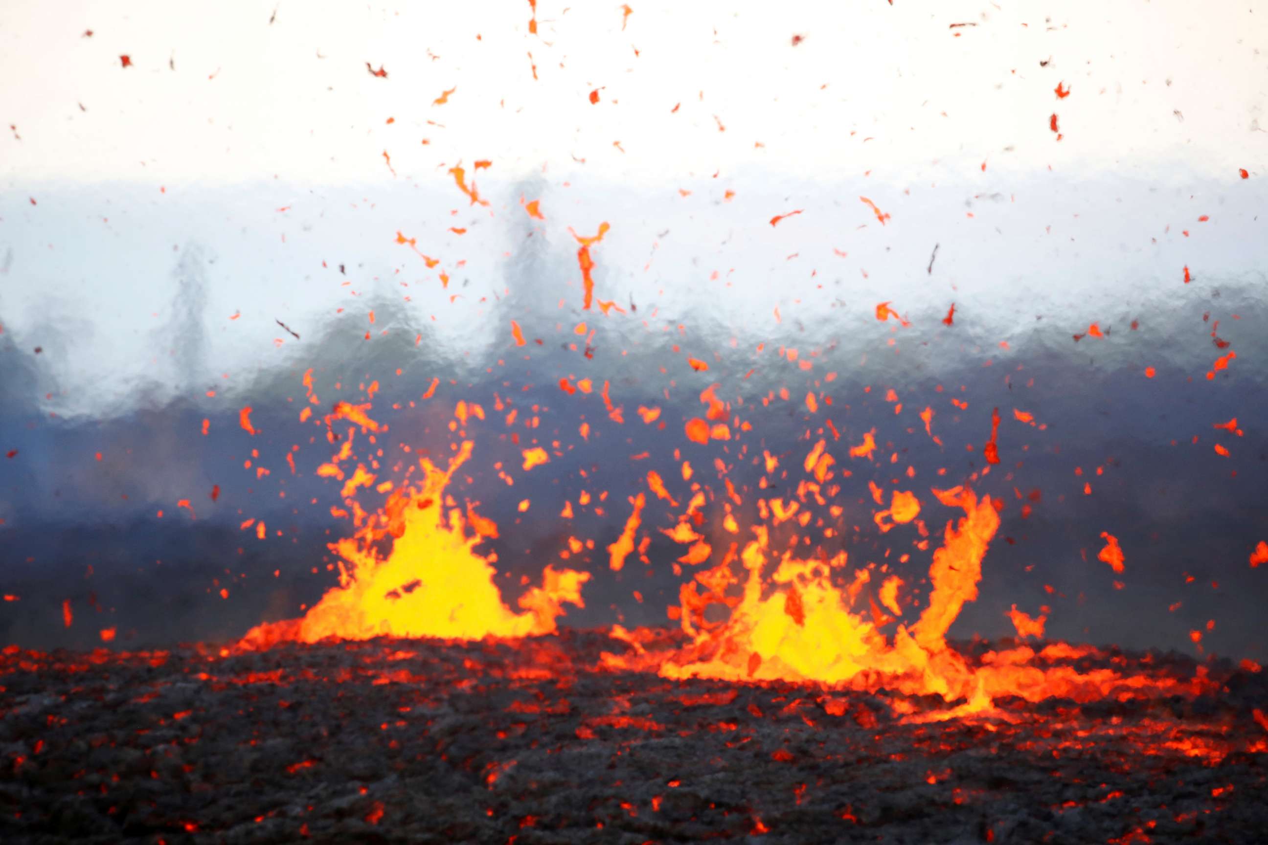 PHOTO: Lava erupts from a fissure on the outskirts of Pahoa during ongoing eruptions of the Kilauea Volcano in Hawaii, May 14, 2018.