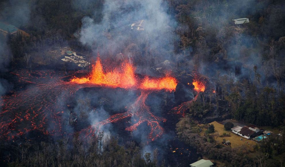 PHOTO: Hot lava spews more than 100 feet into the air near Pahoa, Hawaii, May 6, 2018.