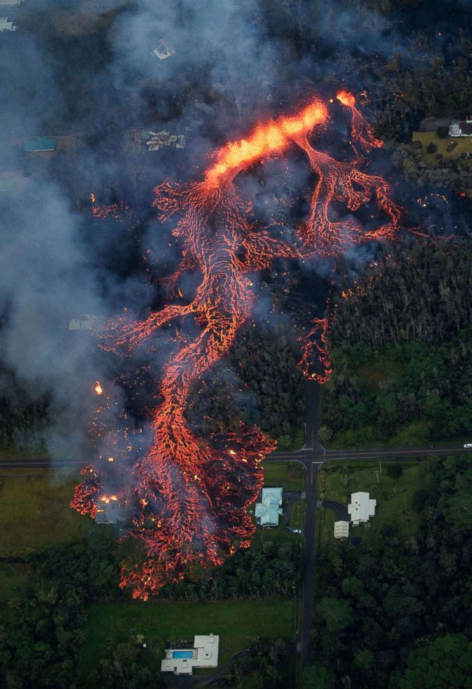 PHOTO: Volcanic lava flows down Kilauea's east rift zone, as a robust fissure eruption in Leilani Estates sends a massive flow into the subdivision, near Pahoa, Hawaii, May 6, 2018.