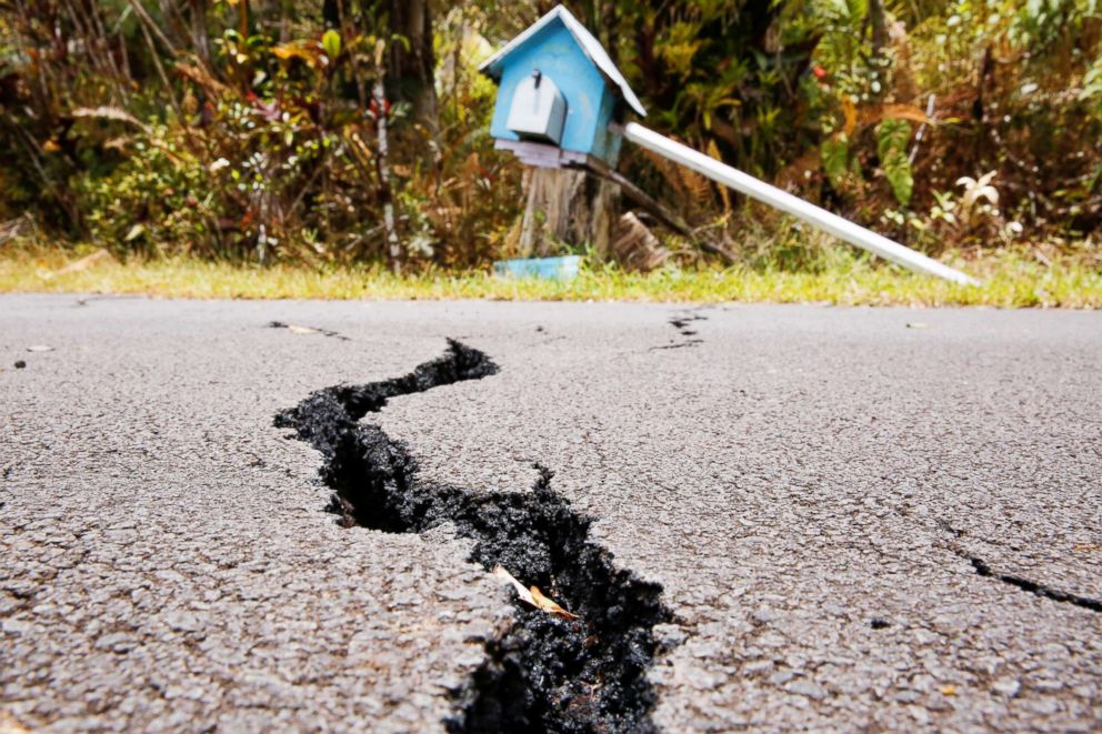 PHOTO: A crack is seen in a road in the Leilani Estates subdivision during ongoing eruptions of the Kilauea Volcano in Hawaii, May 13, 2018.