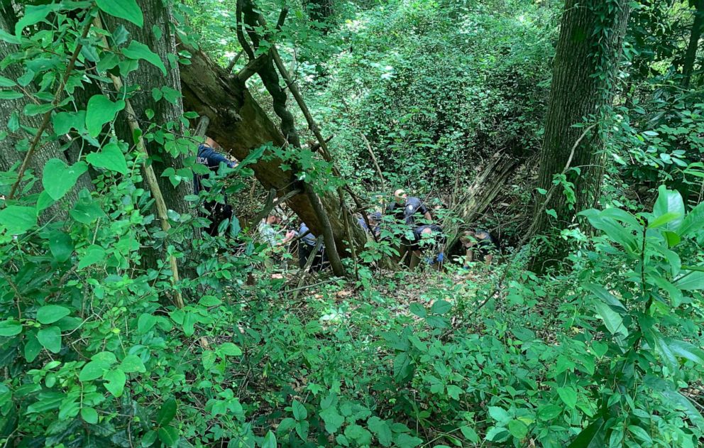 PHOTO: Authorities investigate a scene where officials say a head and torso were found near a creek in Seneca, S.C., on June 24, 2019.