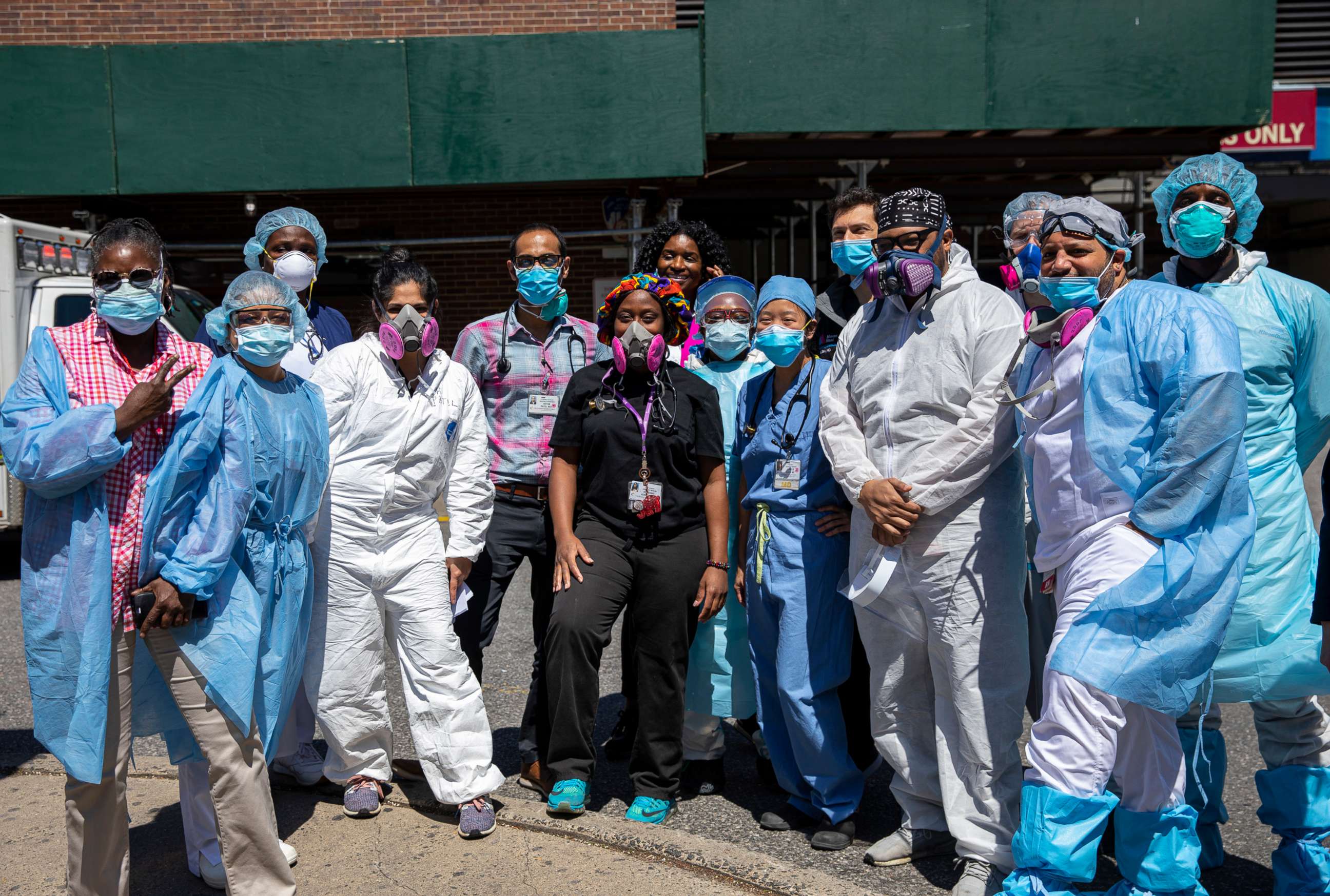PHOTO: In this April 28, 2020, file photo, doctors, nurses and emergency medical staff of the Brooklyn Hospital Center pose of a picture in Brooklyn, N.Y.